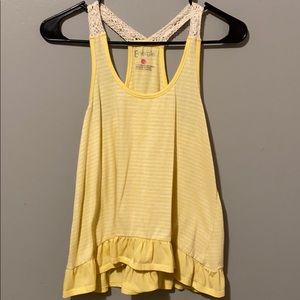 Yellow high low ruffled tank